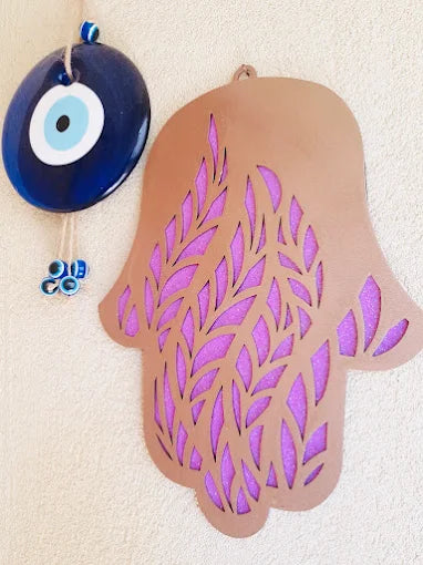Israeli handmade Hamsa wall art with geometric metal design in rose gold