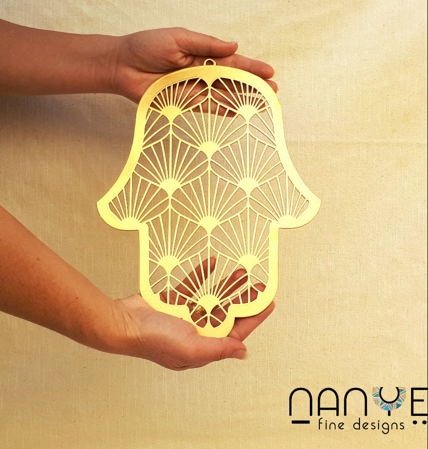 Handmade Gold Hamsa wall hanging from Israel, spiritual metal home decor for protection and good luck