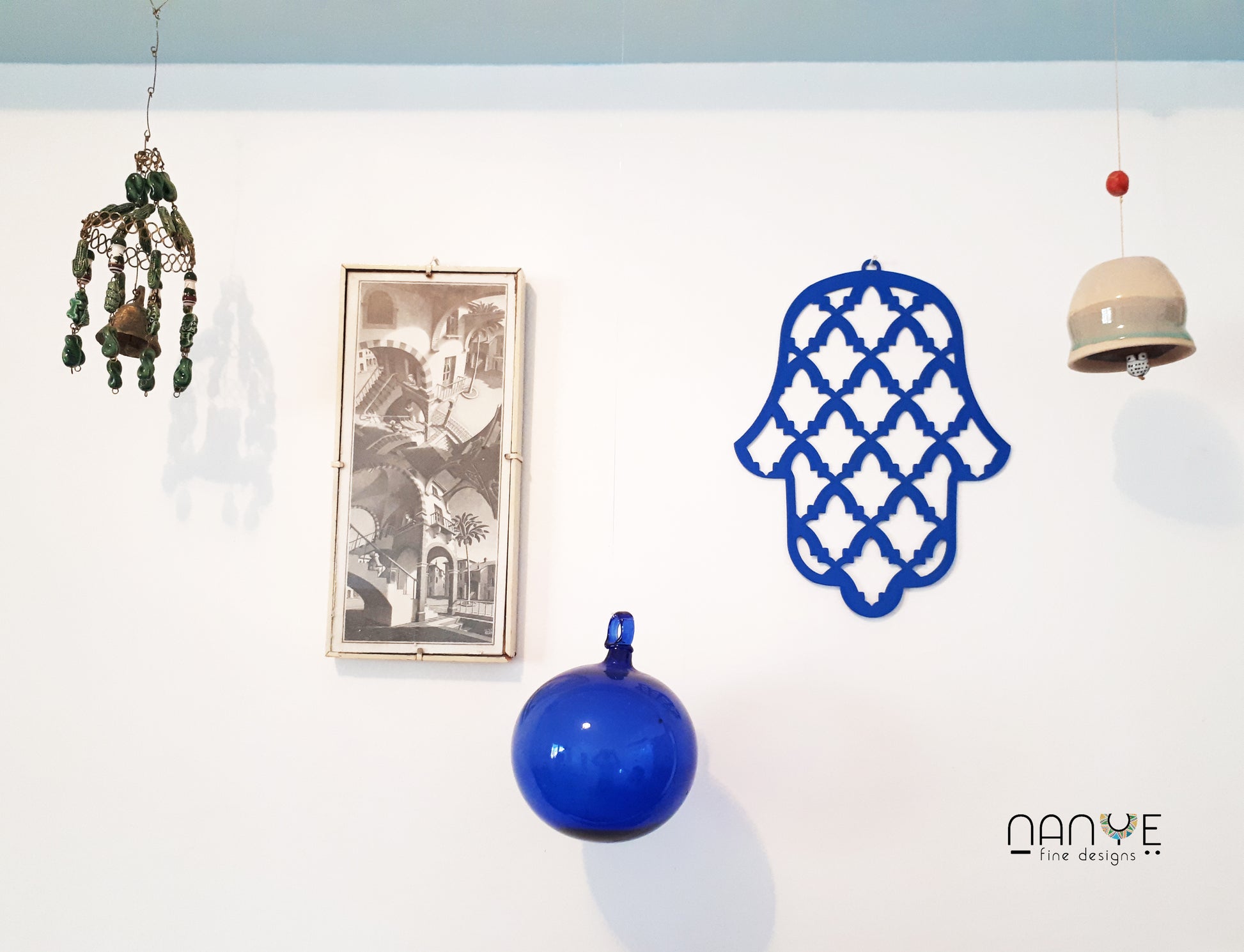 Israeli handmade Hamsa wall art with geometric metal design in blue