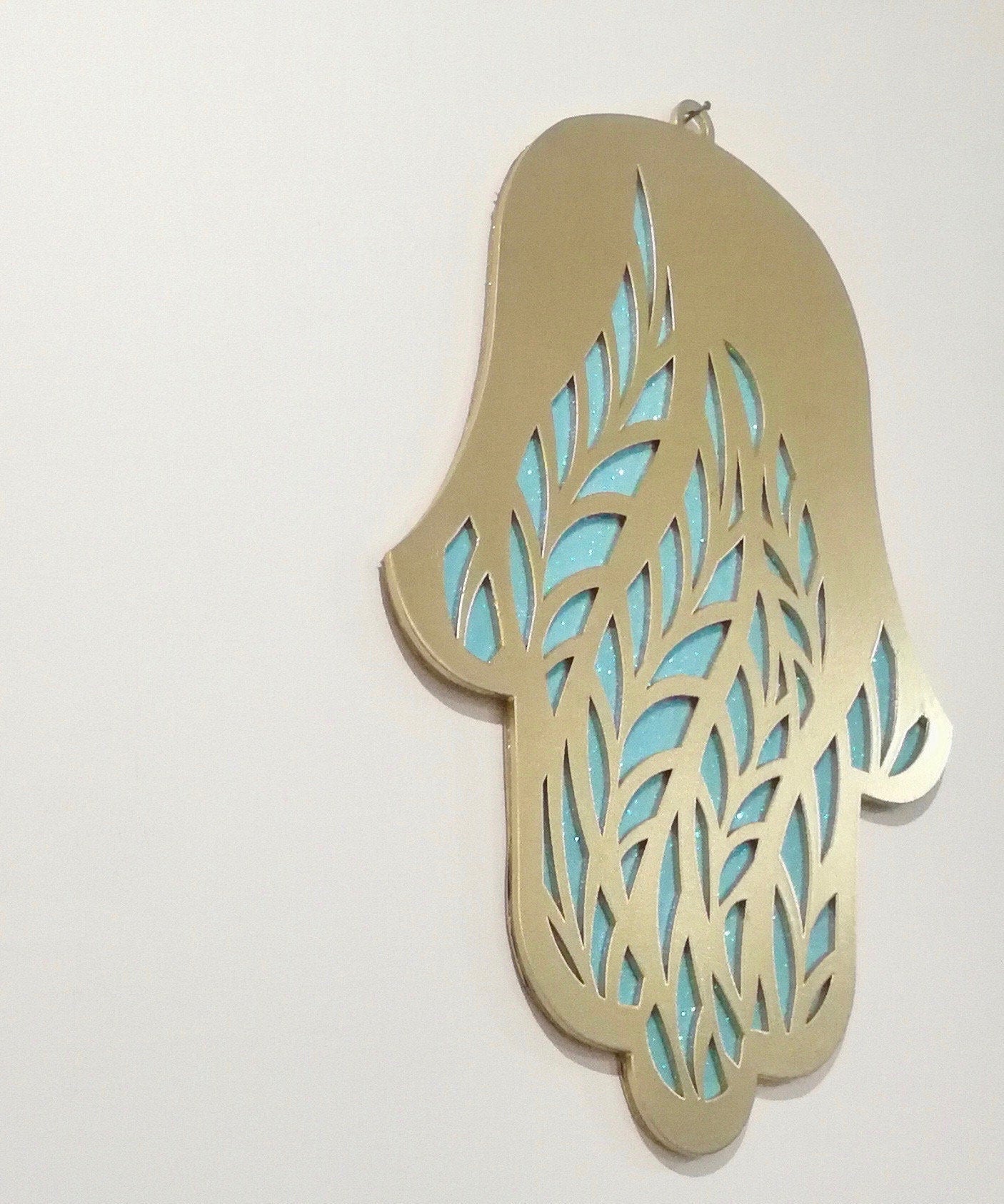 Meaningful handmade Hamsa wall hanging from Israel as spiritual home decor gift