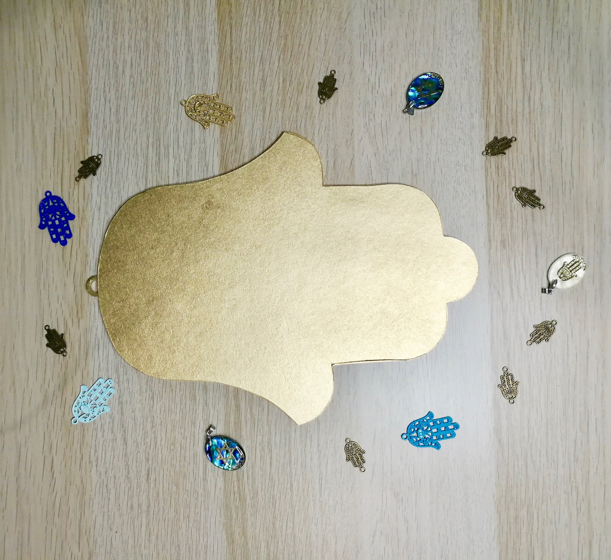 Handmade Israeli Hamsa wall decor displayed as spiritual home protection art